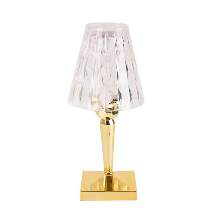 Krystal bordlampe med funklende design i sølv, tilfører elegant stemning, ideel til moderne og klassiske rum.