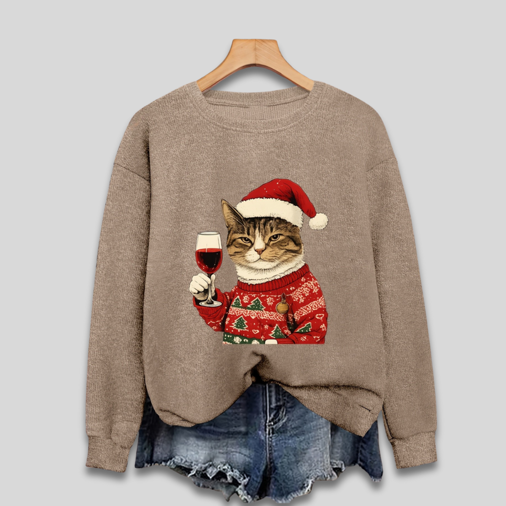 Festlig damestrik med kat og juleprint. En sjov, hyggelig julesweater til julefrokost eller vinterhygge.