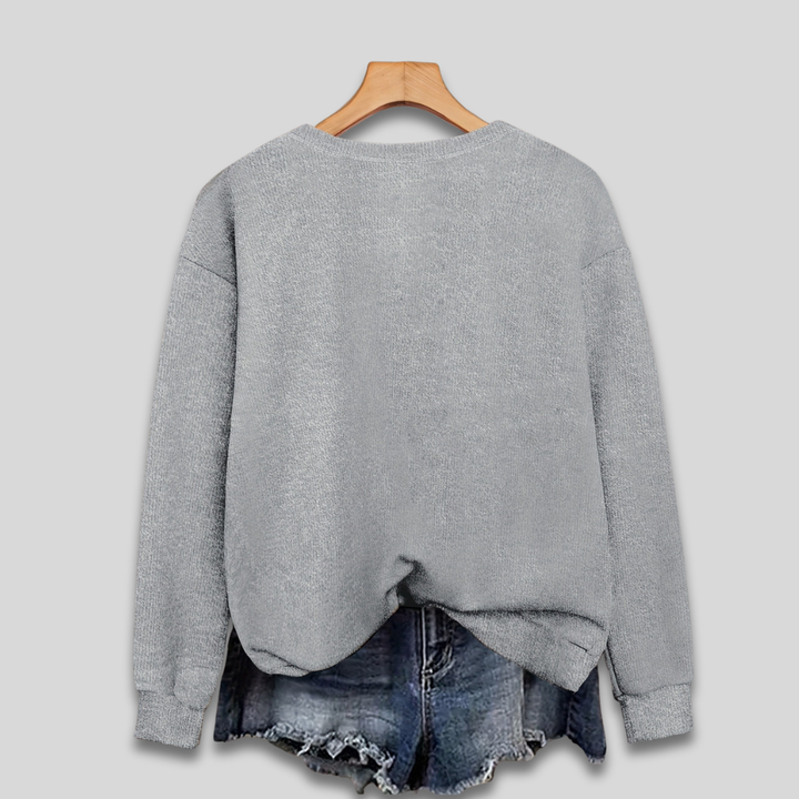 Vintertøj: Dametrøje i grim julesweater stil med kat. Sjovt og festligt design til den kommende jul.