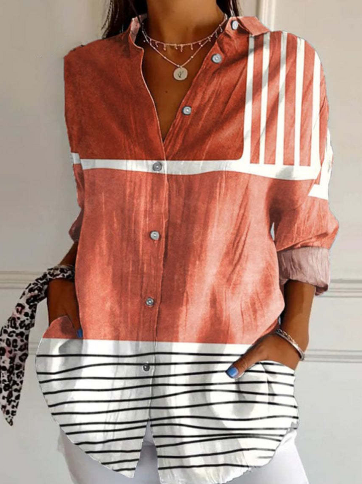 Elegant langærmet knapskjorte til kvinder med trendy striber. Alsidig casual fashion bluse til dame.
