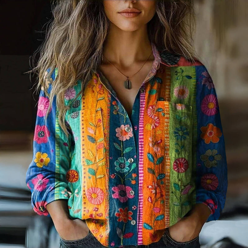 Kvinde vintage bluse med elegant blomsterprint og krave. Langærmet design perfekt til forår og efterår.