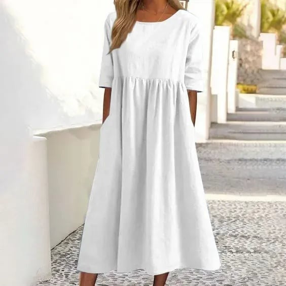 Kvinder afslappet knapkjole i let stof. Perfekt som stilfuld hverdagskjole til sommer. Elegant og feminin maxikjole.