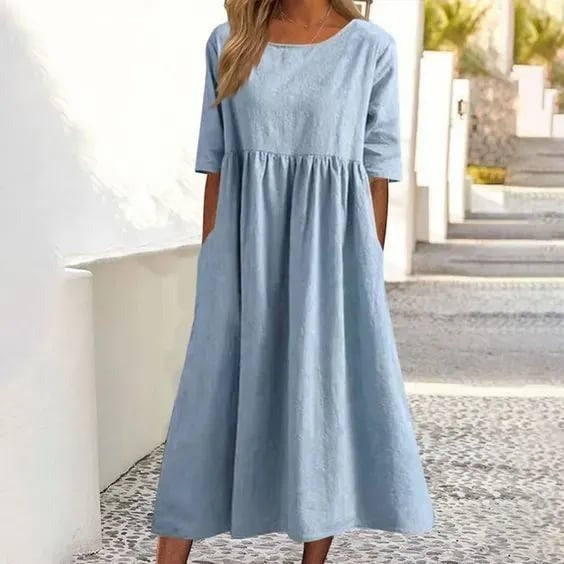 Elegant og alsidig kvinde maxikjole. Afslappet knapkjole, let at style til både sommer og hverdag. Feminin langkjole.