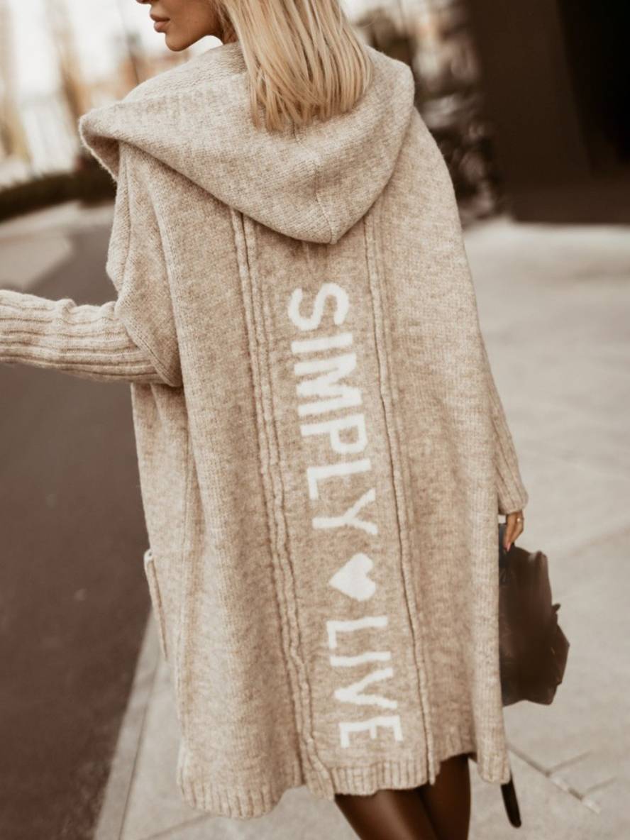 Efterårs-inspireret oversized hættetrøje til kvinder med trendy print og hyggelig pasform.