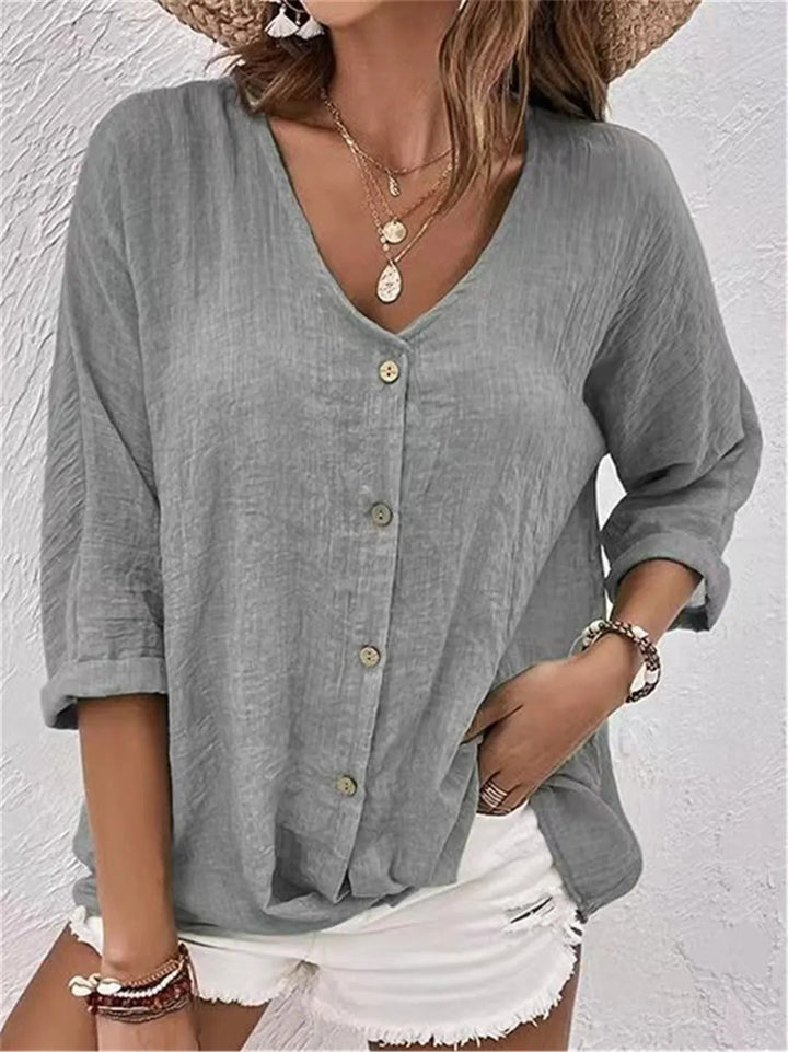 Brun komfortabel kvinders casual skjorte med knapper. Blød bluse i løs pasform, perfekt til afslappet hverdagsstil.