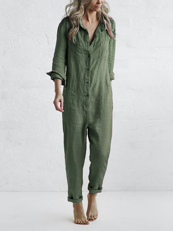 Sort damejumpsuit med lange ærmer og løs pasform. Ideel til både hverdag og fest.