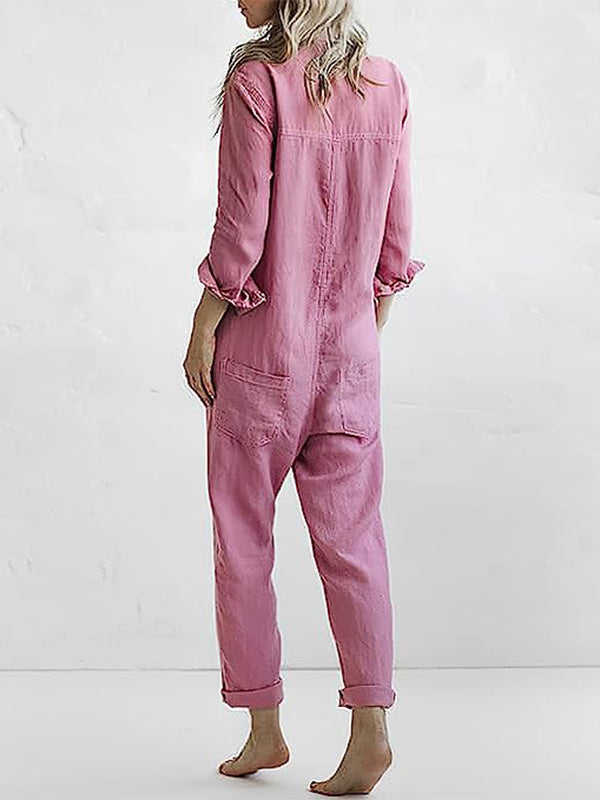 Sort langærmet damejumpsuit med løs pasform, der kombinerer stil og ultimativ komfort.
