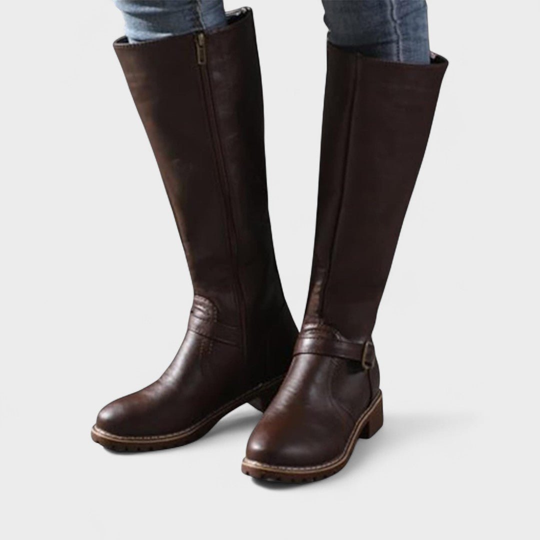 Et par elegante, ortopædiske knæhøje damestøvler, klar til at give komfort i hverdagen.