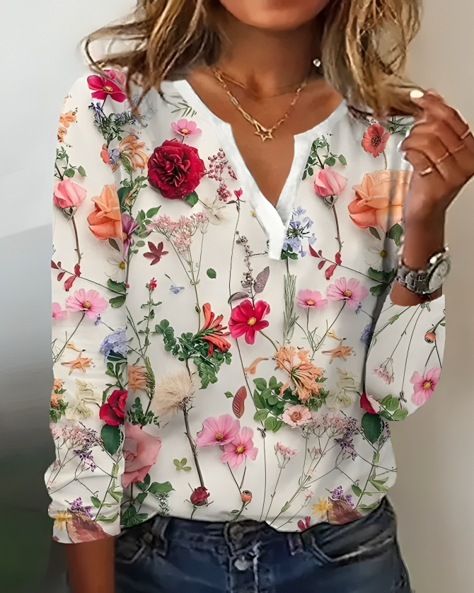 Kvinders blomsterprint bluse med V-udskæring & lange ærmer. En feminin forårs-/sommerbluse.