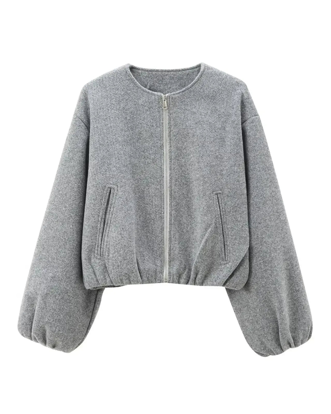 Kort kvindebomberjakke med trendy ballonærmer. Elegant og casual modejakke til enhver lejlighed.
