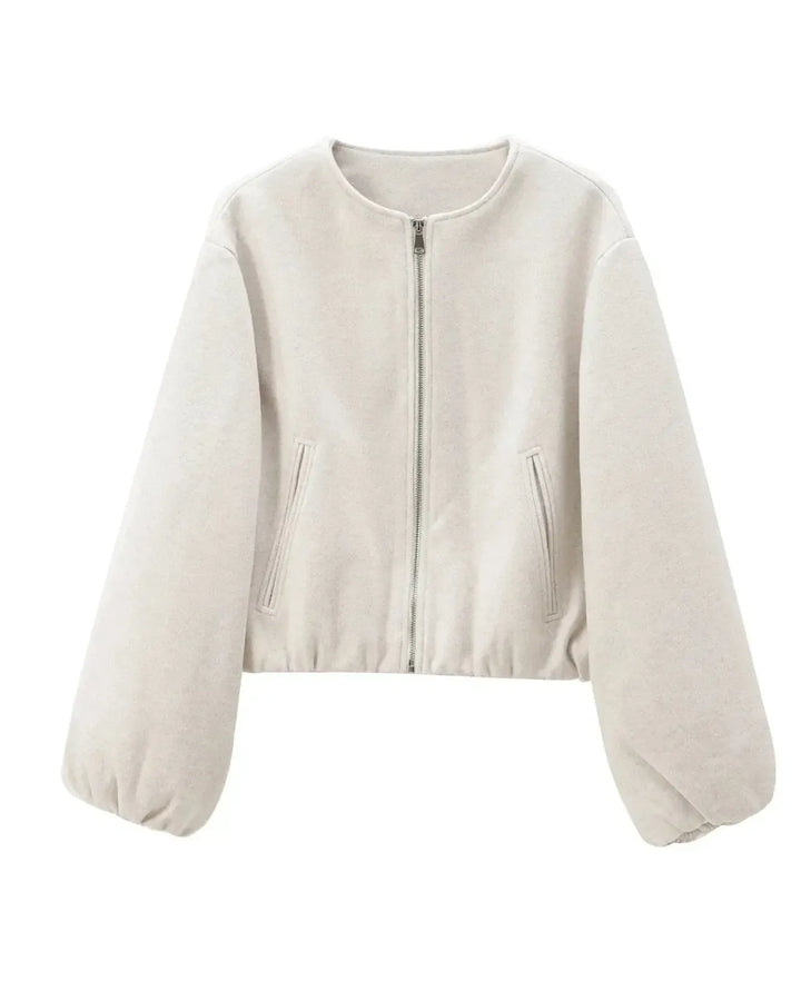 Alsidig kort kvindebomberjakke, der passer til både casual og elegant stil. Must-have modejakke.