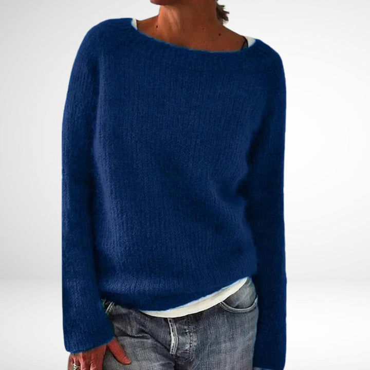Kvinders hyggelig retro vintersweater i elegant fransk stil. Farverig striktrøje, perfekt til vintermode.