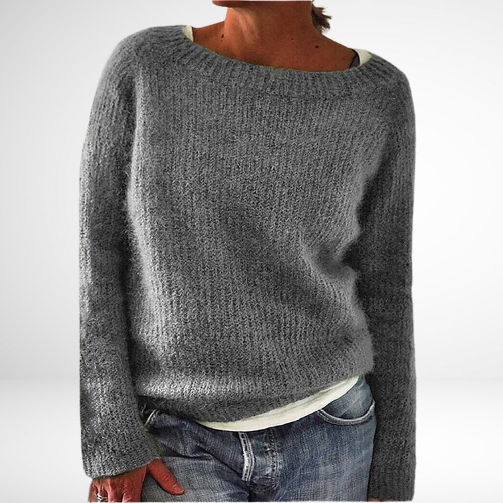 Varm og hyggelig kvindesweater med retro-look. Elegant striktrøje i farverig fransk stil, ideel til vinter.