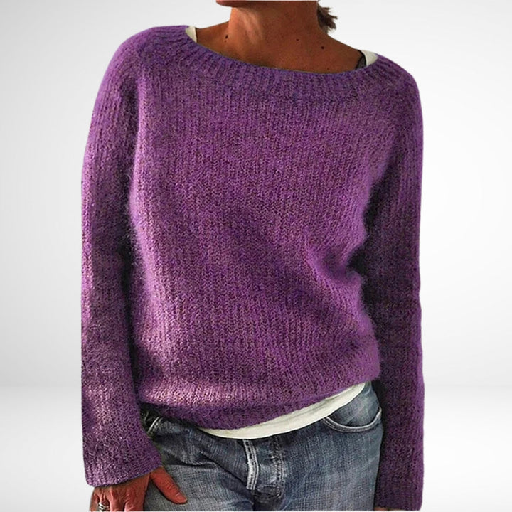 Farverig kvindesweater i retro fransk stil. Hyggelig, elegant striktrøje med lange ærmer til vintermode.
