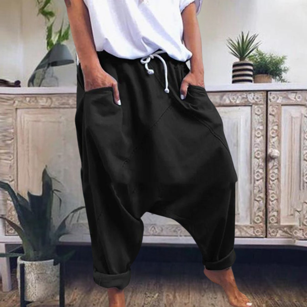 Komfortable baggy damebukser med stilfuldt lavt skridt, perfekte til et afslappet og trendy forårs-/sommerlook.