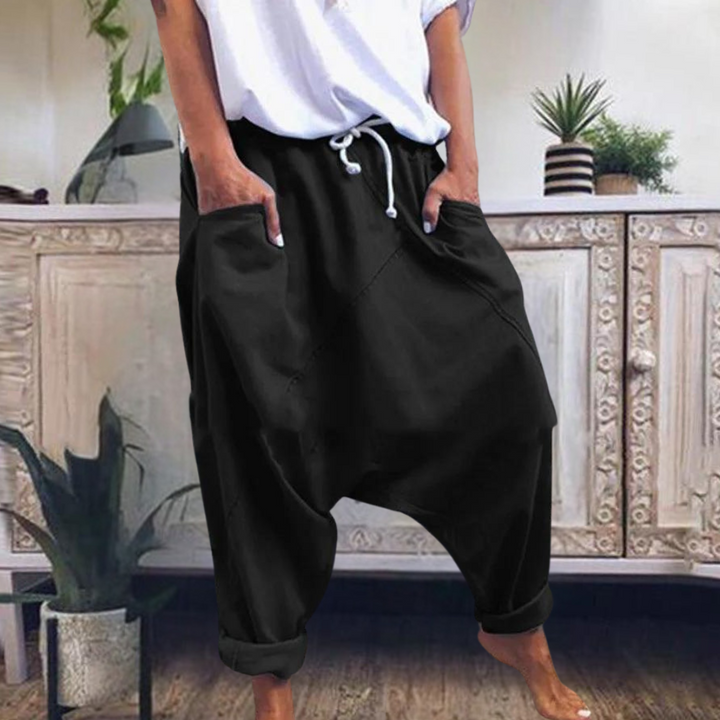 Komfortable baggy damebukser med stilfuldt lavt skridt, perfekte til et afslappet og trendy forårs-/sommerlook.