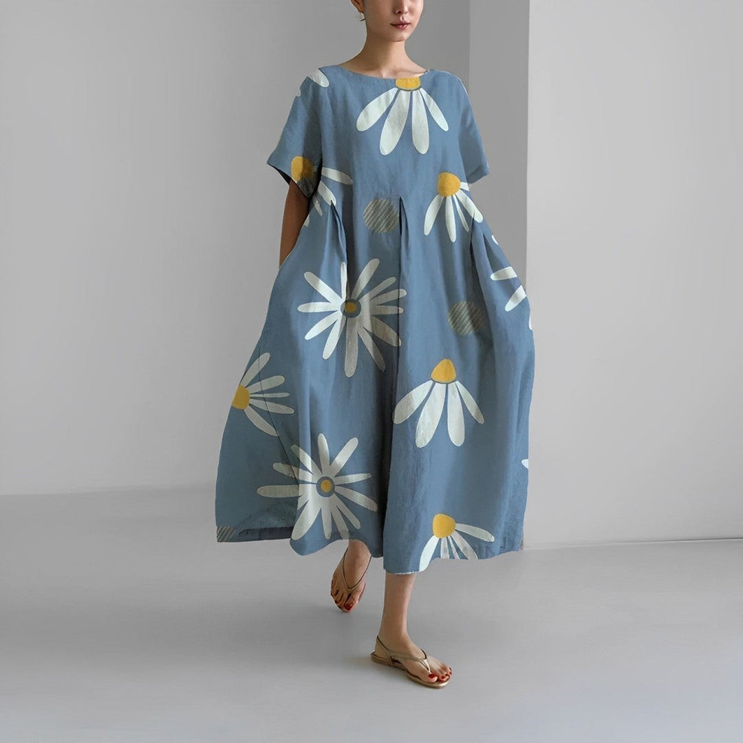 Blomstret hverdagskjole i løs pasform, elegant boho look til damer med en feminin stil.