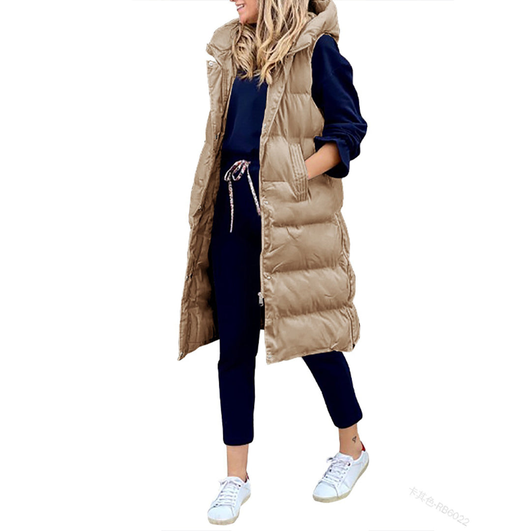 Lang dame puffer vest med hætte. Stilfuld og varm vintervest til kvinder.