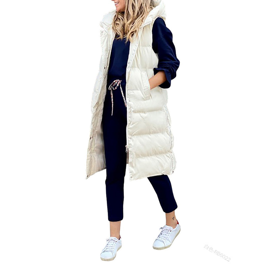 Dame lang puffer vest, med hætte. Ideel til overgangsvejr.