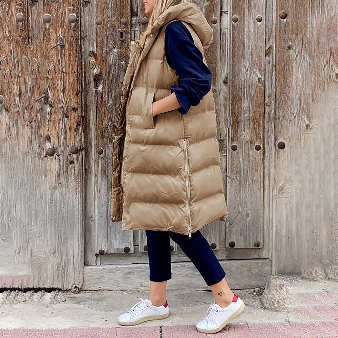 Dame hættevest, lang puffer model. Perfekt til efterår og vinter.