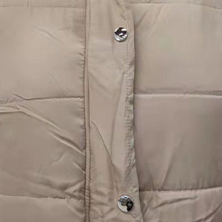 Dame lang vest, puffer, med hætte. Trendy overtøj til koldere dage.