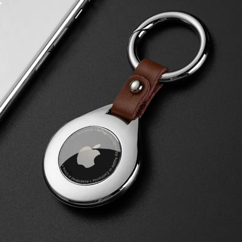 AirTag læder-metal nøglering etui, elegant design med robust metalramme og luksuriøst læderfinish.