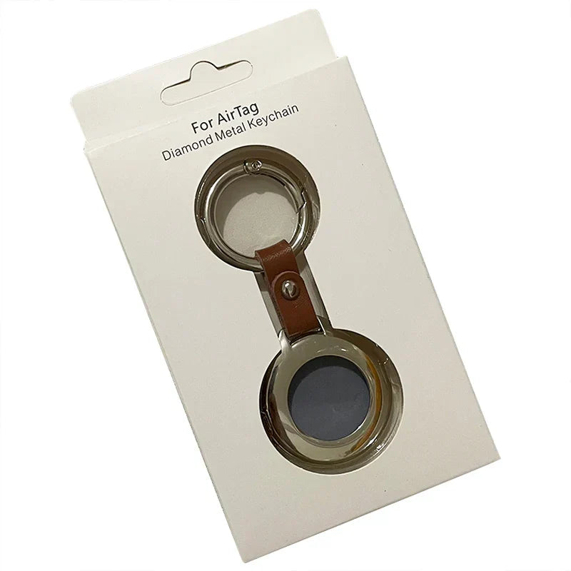 AirTag læder-metal nøglering etui, elegant design med robust metalramme og luksuriøst læderfinish.