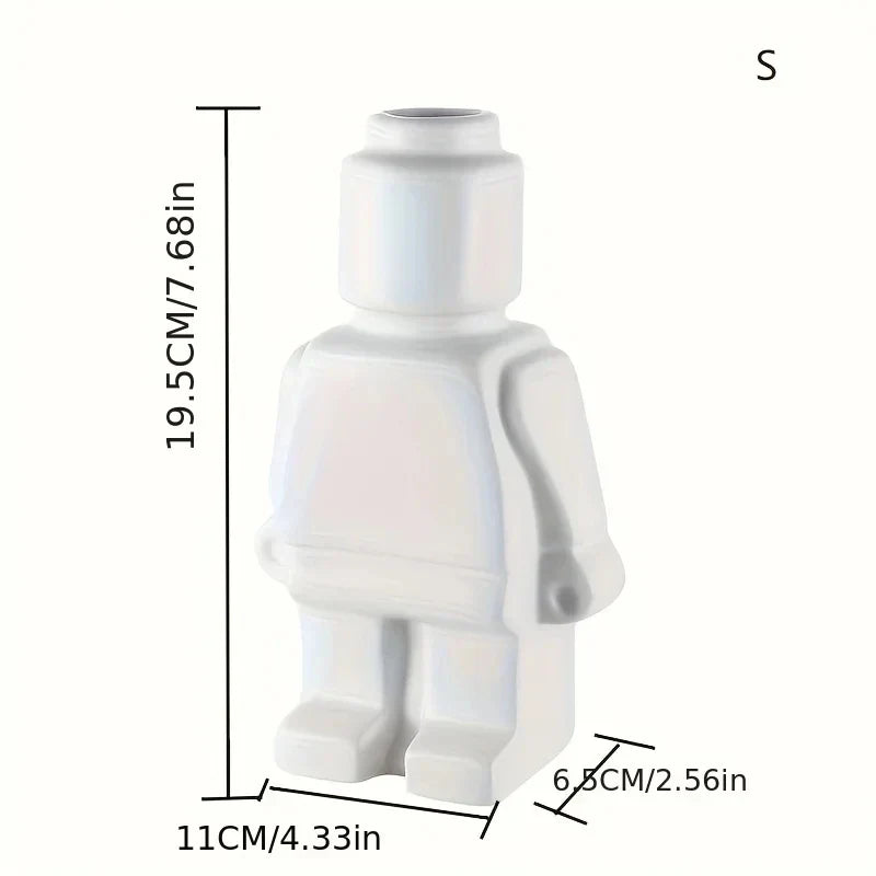 Legolignende keramikvase i moderne design, hvid vase med legende robotlook til stilfuld bolig- og kontorindretning.