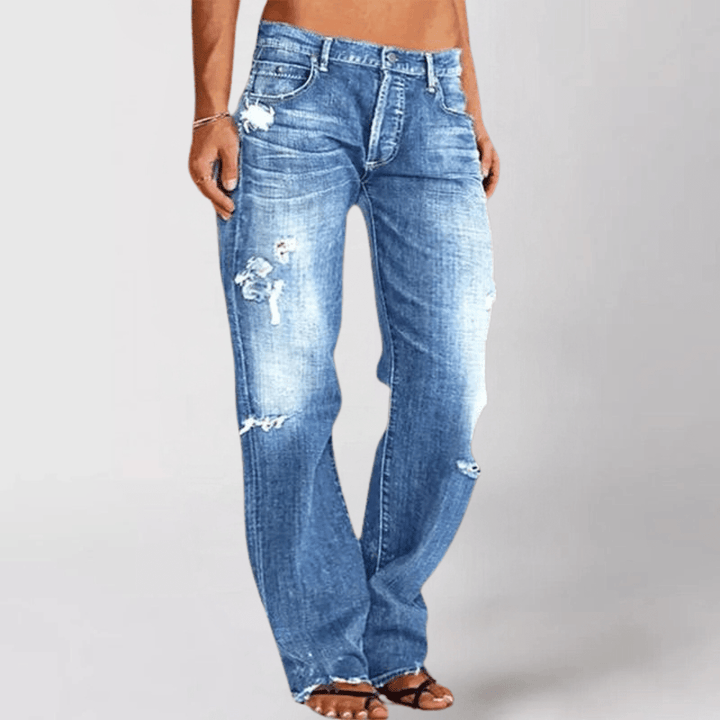 Damejeans med vide ben, distressed look og slid. Perfekt til forårsmode og hverdag.