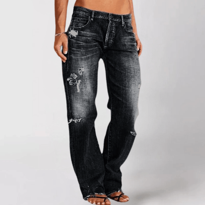 Komfortable damejeans med vide ben og fede sliddetaljer. Moderne distressed look.