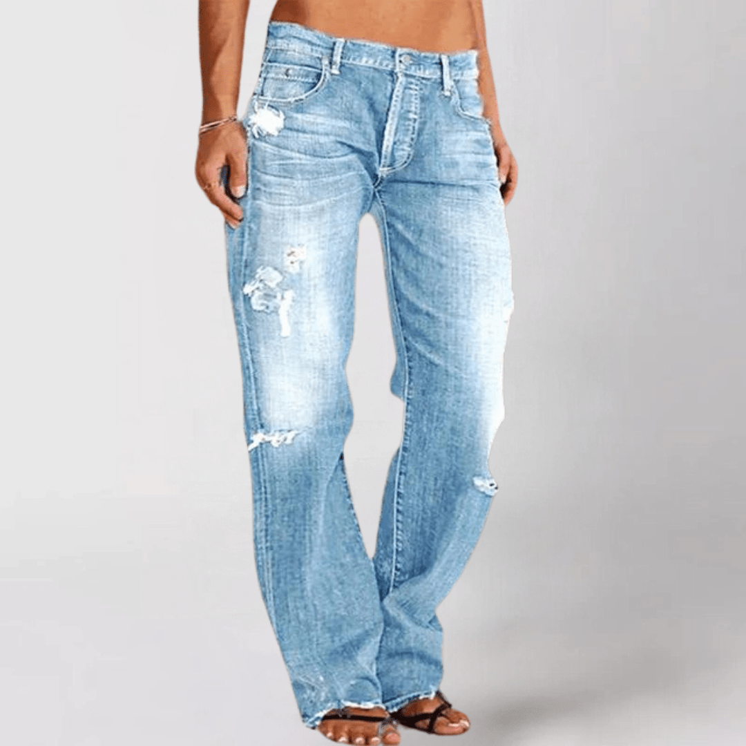 Trendy damebukser: jeans med vide ben og markant distressed look. Til stilfuld fritid.