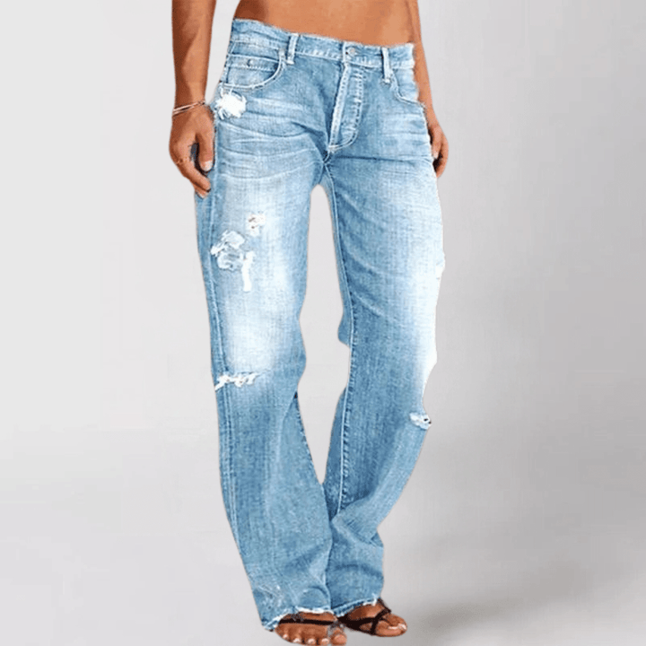 Trendy damebukser: jeans med vide ben og markant distressed look. Til stilfuld fritid.