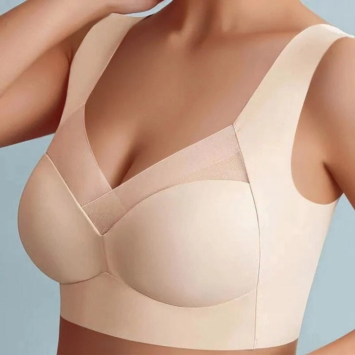 Usynlig LoveYourShape sømløs BH i hudfarve, perfekt under stramt tøj. Komfortabel og glat finish.