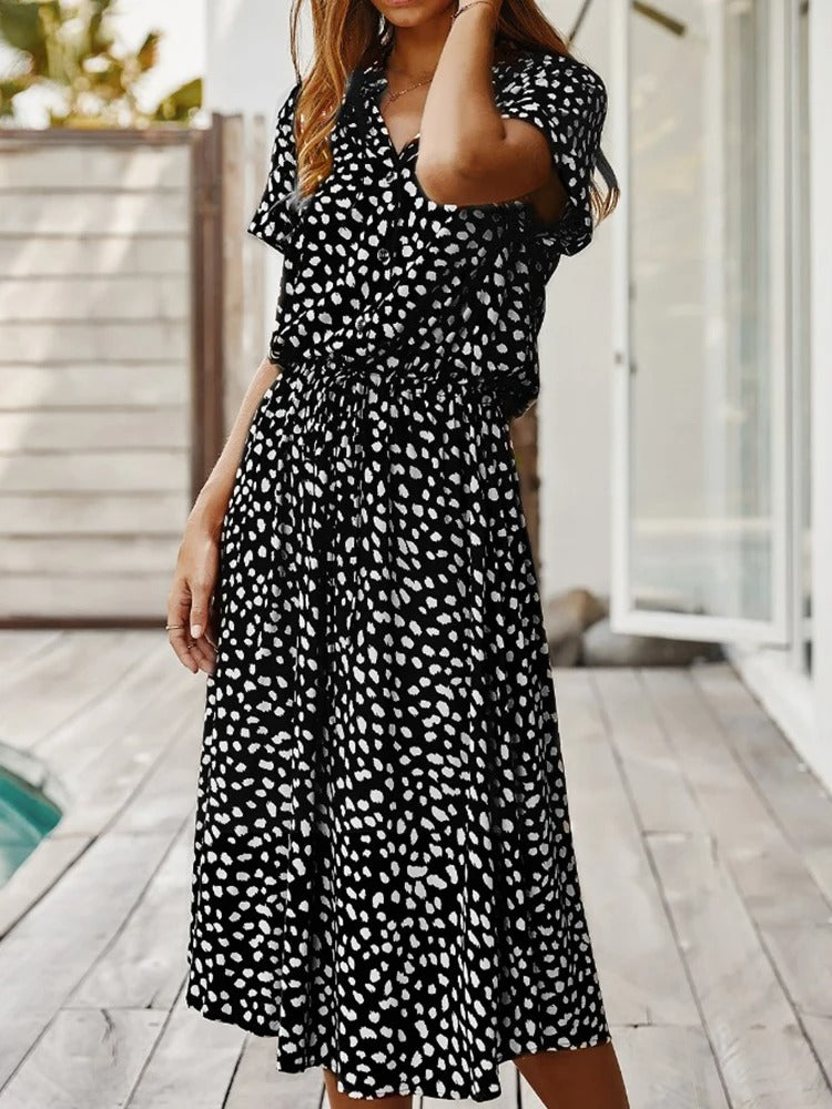 Luftig, behagelig sommerkjole til dame, designet til sol og lethed.