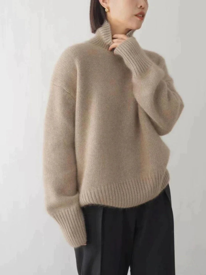 Cashmere rullekrave sweater til kvinder. Eksklusiv, blød trøje for varme og stil i vintermånederne.