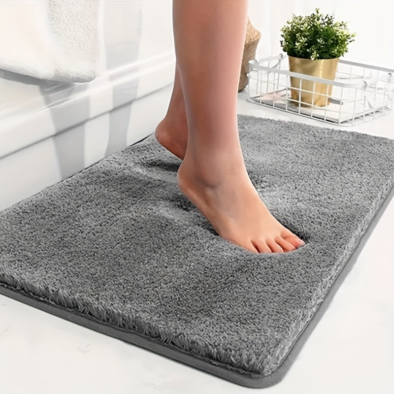 Luksuriøs skridsikker bademåtte i blød mikrofiber for ultimativ komfort i badeværelset.