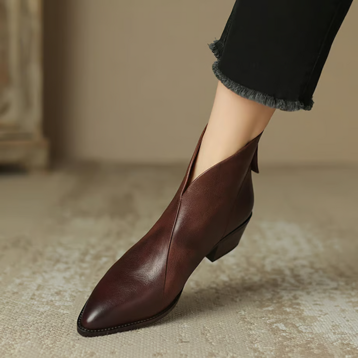 Elegante ankelstøvler til kvinder med stabil hæl og premium læderkvalitet. Komfortabelt fodtøj.