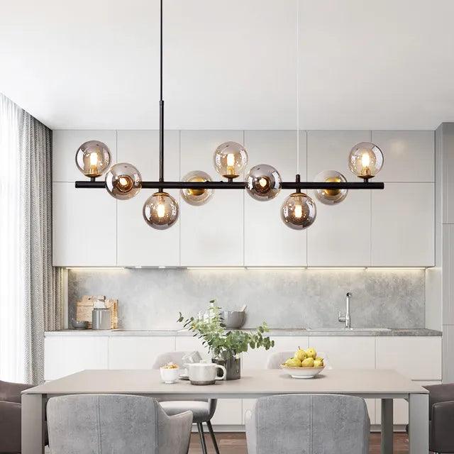 LumaSphere loftlampe. Moderne glas lysekrone med lang pendel, giver elegant stuebelysning og er en designlampe.
