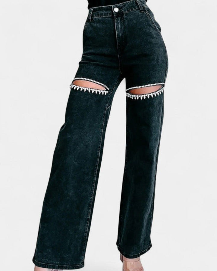 Trendy dame jeans med høj talje og bredt ben. Komfortable wide leg bukser med stilfuld rå slid detalje.