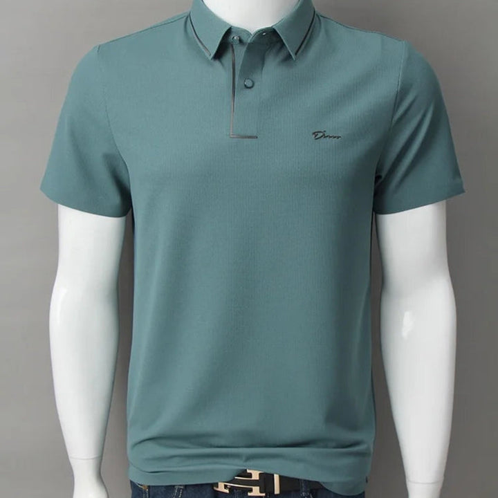 Herre kortærmet polo med stilfuldt print og knapkrave. Komfortabelt og trendy casual tøj til mænd.