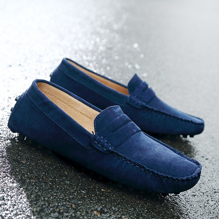 Sorte læder loafers for mænd, kombinerer elegance og afslappet komfort til fest.