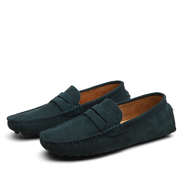 Stilfulde grå herre loafers, komfortable og velegnede til både arbejde og fritid.