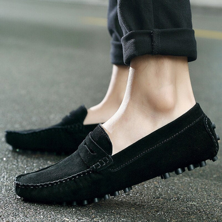 Elegante sorte herre loafers med komfortabel pasform, ideelle til fest og kontor.
