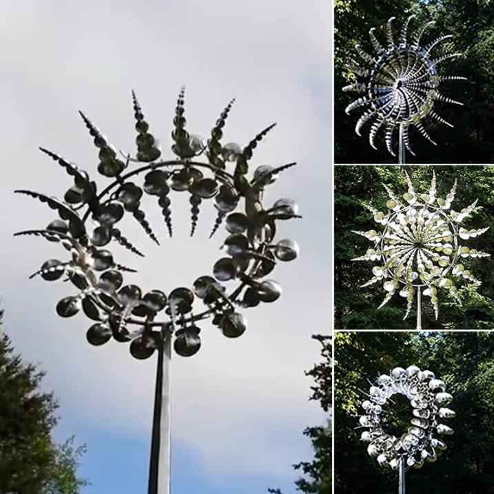 Metalvindmølle i have med tovinge-teknologi, skaber dynamisk visuel effekt og atmosfære.