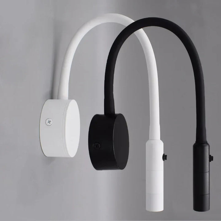 Minimalistisk læse-væglampe med fleksibel arm, LED-teknologi, i sort eller hvid. Ideel til læsning, energibesparende design.