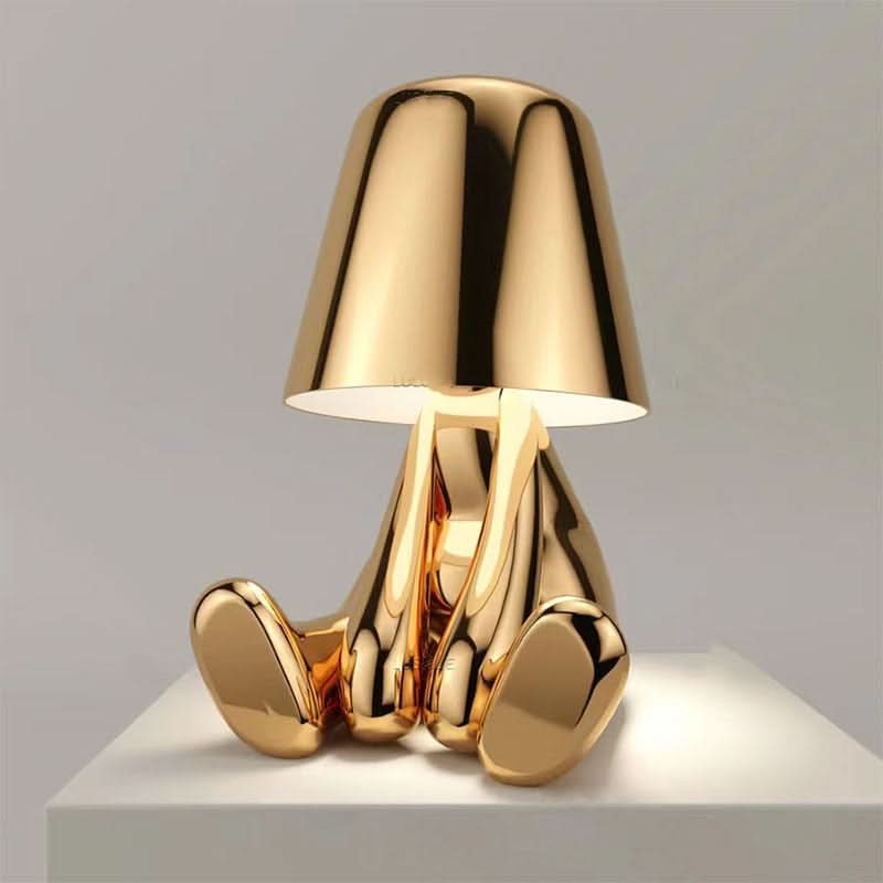 Moderne genopladelig LED bordlampe i guld. Trådløs dæmpbar stemningslys til indendørs indretning.