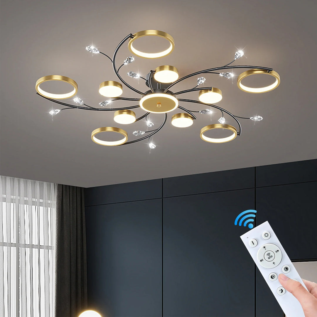 Moderne LED-loftlampe, dæmpbar, i elegant guld-sort, for stilfuldt udtryk i soveværelse og spisestue.