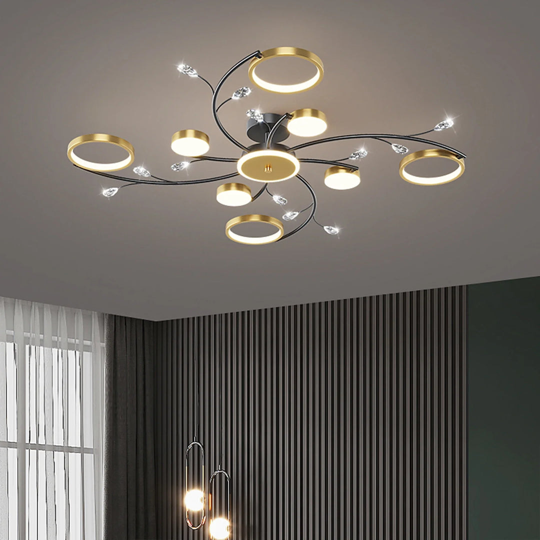 Moderne LED-loftlampe, dæmpbar, i elegant guld-sort, for stilfuldt udtryk i soveværelse og spisestue.