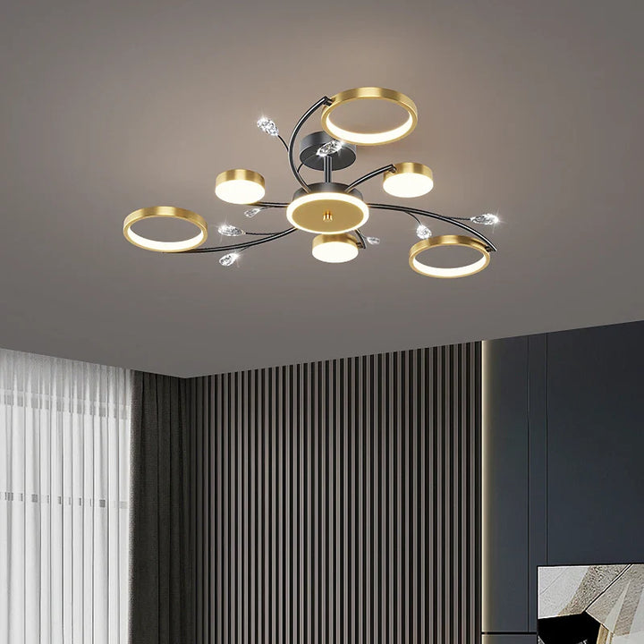 Moderne LED-loftlampe, dæmpbar, i elegant guld-sort, for stilfuldt udtryk i soveværelse og spisestue.