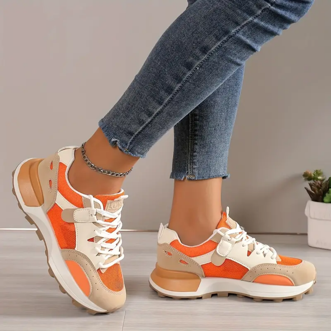 Kvinder letvægts sommersneakers i orange, super komfortable til lange dage. Moderne og stilfuldt fodtøj.